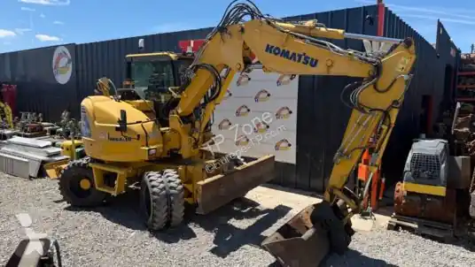 Pelle sur pneus Komatsu pw98mr-8 à 39 900 ht occasion Haute Qualité