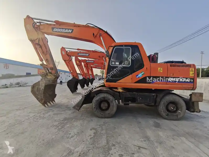 Pelle sur pneus Doosan DH210W-7 Gazoil occasion Remise