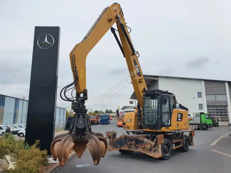 Pelle sur pneus Caterpillar 302 MH4 / Schrottgreifer / 2018 / 9.424h occasion Produit De Marque