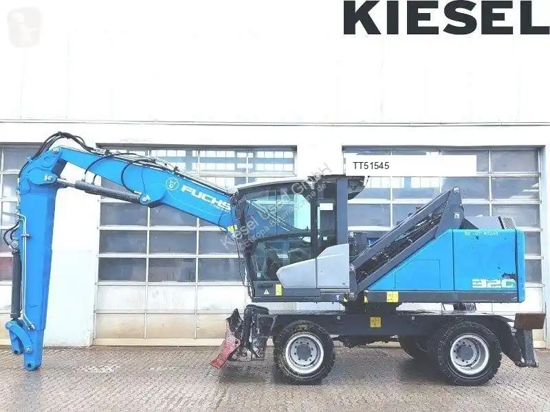 Pelle de manutention Fuchs MHL 320 F MHL320 occasion Certifié