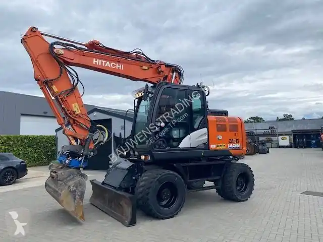 Jusqu'à Épuisement Des Stocks Pelle sur pneus Hitachi ZX40 140 W-6 occasion